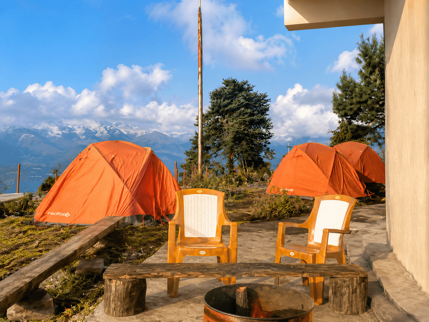 Campfire and tents at Shailung Eco Village Resort